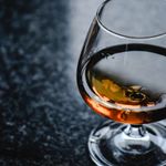 Soft amber light reflection on dark surface